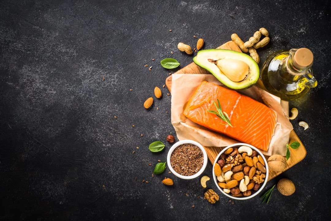 A plate of salmon with avocado, an example of protein and healthy fats in a diabetes diet