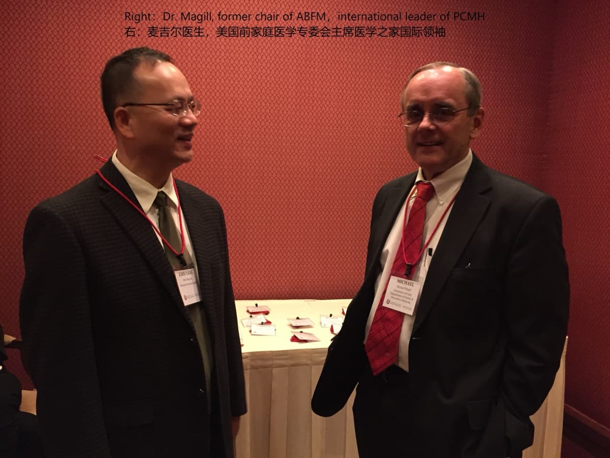 Dr. Lee posing with Dr. Magill, a former chair of the ABFM